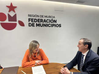 Fotografía del acto de firma del acuerdo