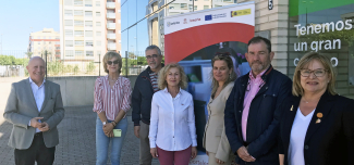 Foto de familia en el acto de firma del acuerdo