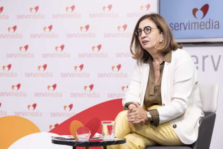 Fotografía de Isabel Matínez Lozano en la presentación del Congreso en Servimedia