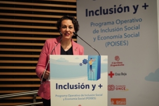 Imagen de la ministra en su intervención en atril